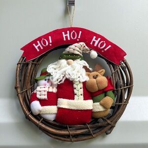 Festive Holiday Wreath with Santa, Snowman, and Reindeer